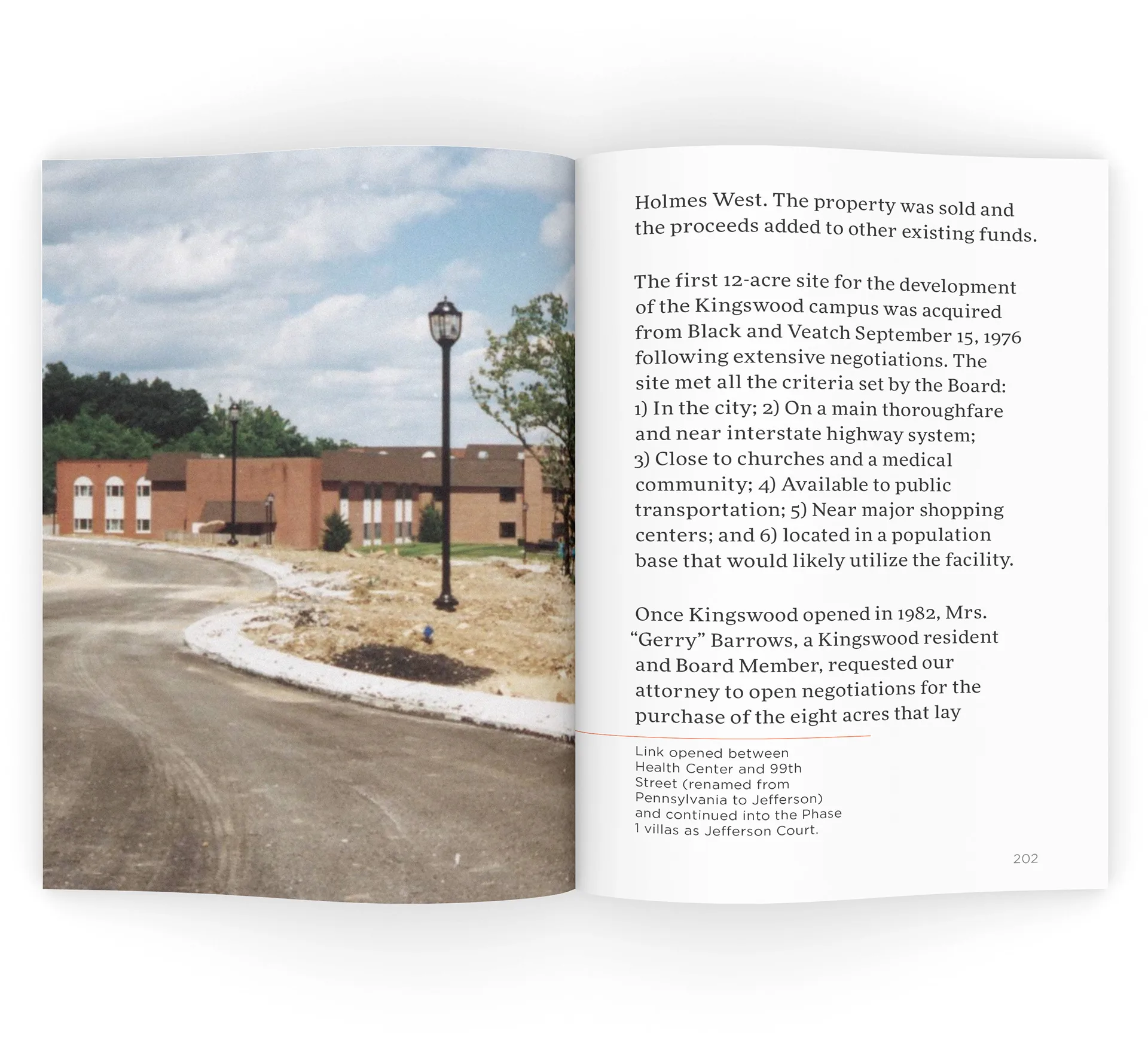 Open book spread with an archival photo of the Kingswood campus building under construction and large-type historical text with a red proofreading underline